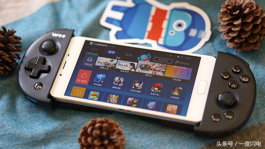 飞智wee手柄支持ios15.0,飞智游戏手柄wee拉伸手柄