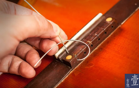 北航吉他,如何换吉他新弦