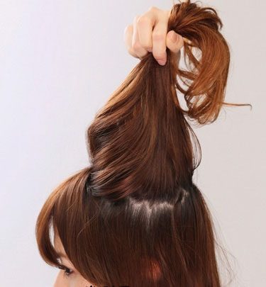 扎头发花苞头教程图解,花苞头的简单扎法蓬松中长发