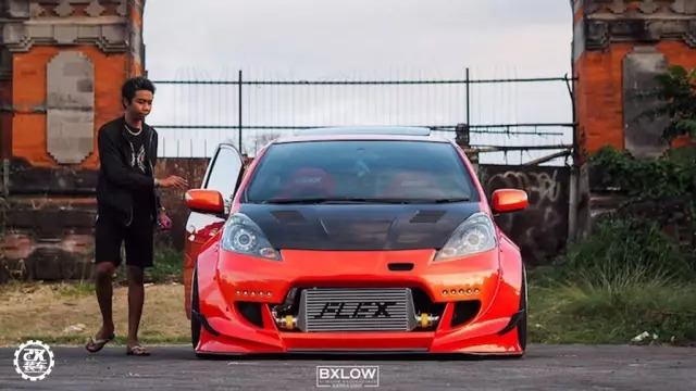 为了装上心仪轮毂换成五孔轴头，这辆爆改宽体的涡轮飞度真帅！