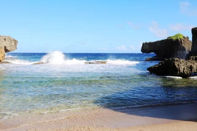 上午在广州捂白过严冬,下午在塞班岛放肆晒黑