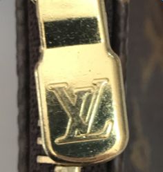 看标辨别lv包包真假,lv拉链真假鉴别方法双肩包