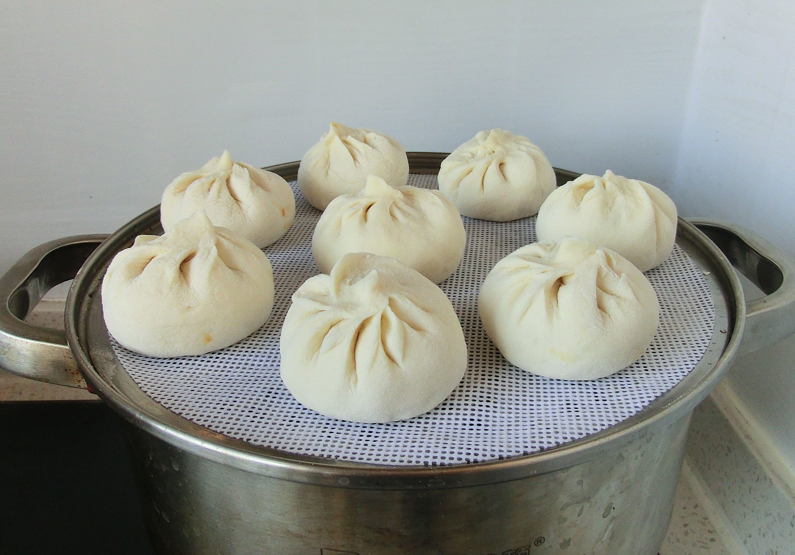 蒸包子要注意什么熟了才不脱皮,蒸包子的做法不要酵母粉