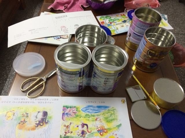 旧奶粉罐改造成小沙发,2个奶粉罐改造花架