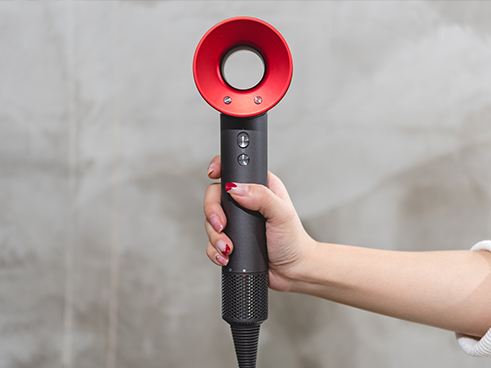 为什么国产吹风机不做成中间空的,为什么国产电吹风出不了一个戴森