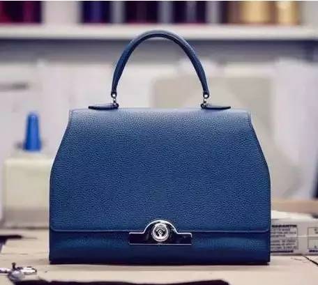 coachmk和mcm,mkmcmcoach档次一样吗