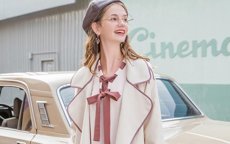 风衣肩膀上有扣子款,风衣肩扣可以摘掉吗