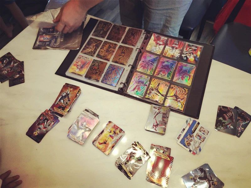 奥特曼卡片是买传奇好还是黑钻好,奥特曼卡片到底该不该给小孩买