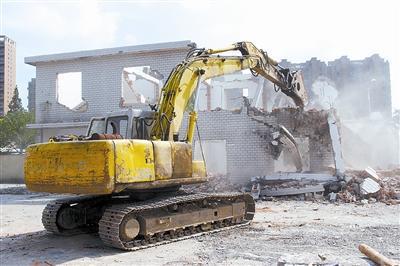 只拆一层房子不伤下面一层怎么拆,房屋整体拆除怎么处理