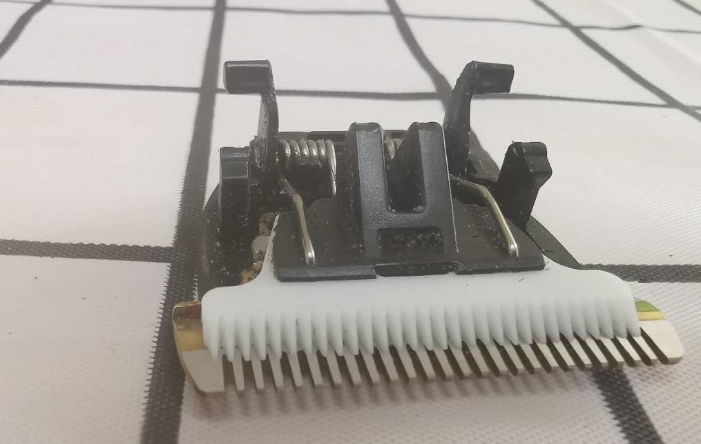 推头理发器工作原理,电动剃头理发器内部结构