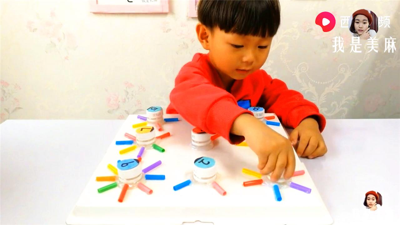 幼儿益智手工玩具制作塑料瓶,废物儿童益智玩具制作