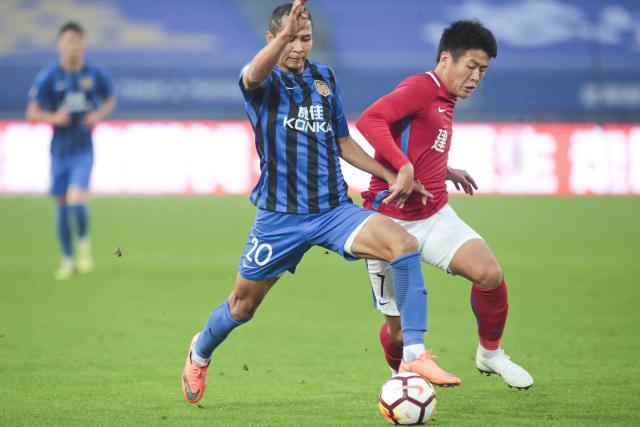 上海国足中场买提江,买提江韦世豪鲁能