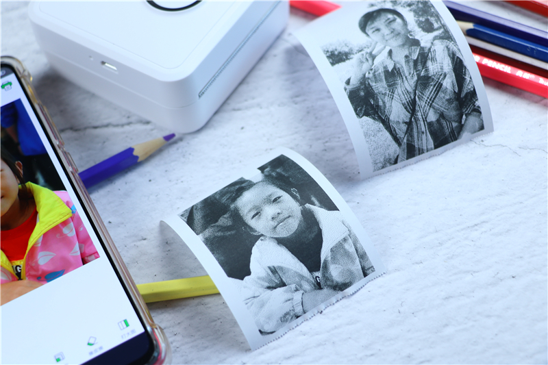 巴掌大小的打印照片的机器,手掌大小的微型口袋书打印