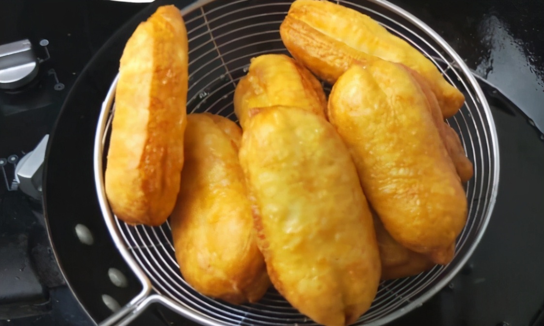 炸油条要怎么发面才能炸出油条来,炸油条可以用酵母和泡打粉发面吗