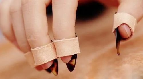 什么材质的古筝指甲音色好,古筝义甲材质