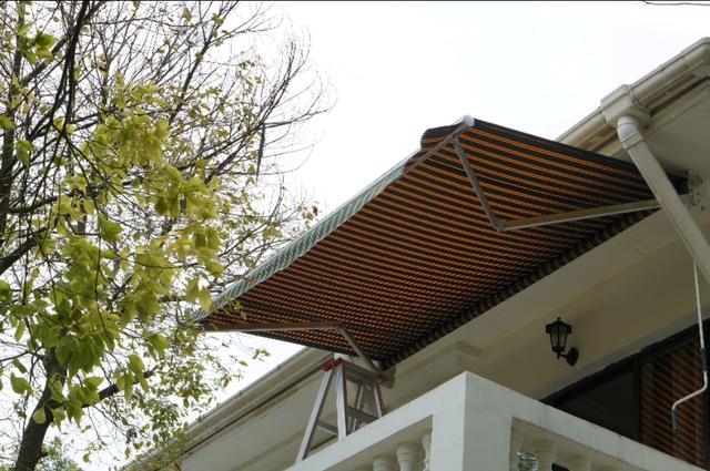 车棚雨棚遮阳棚用什么布,雨棚遮阳篷布美观