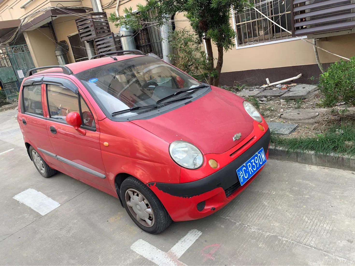 马自达323经典老车,买新车马自达3划算吗