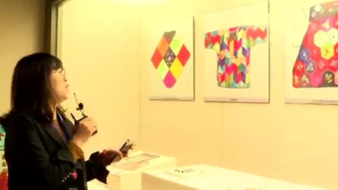 小小童装织就一座城