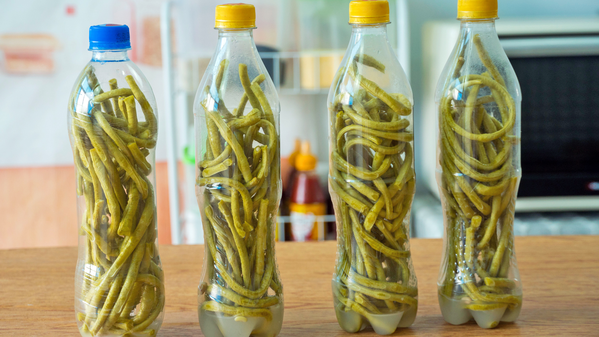 水瓶做酸豆角的方法,矿泉水瓶腌豆角的家常做法