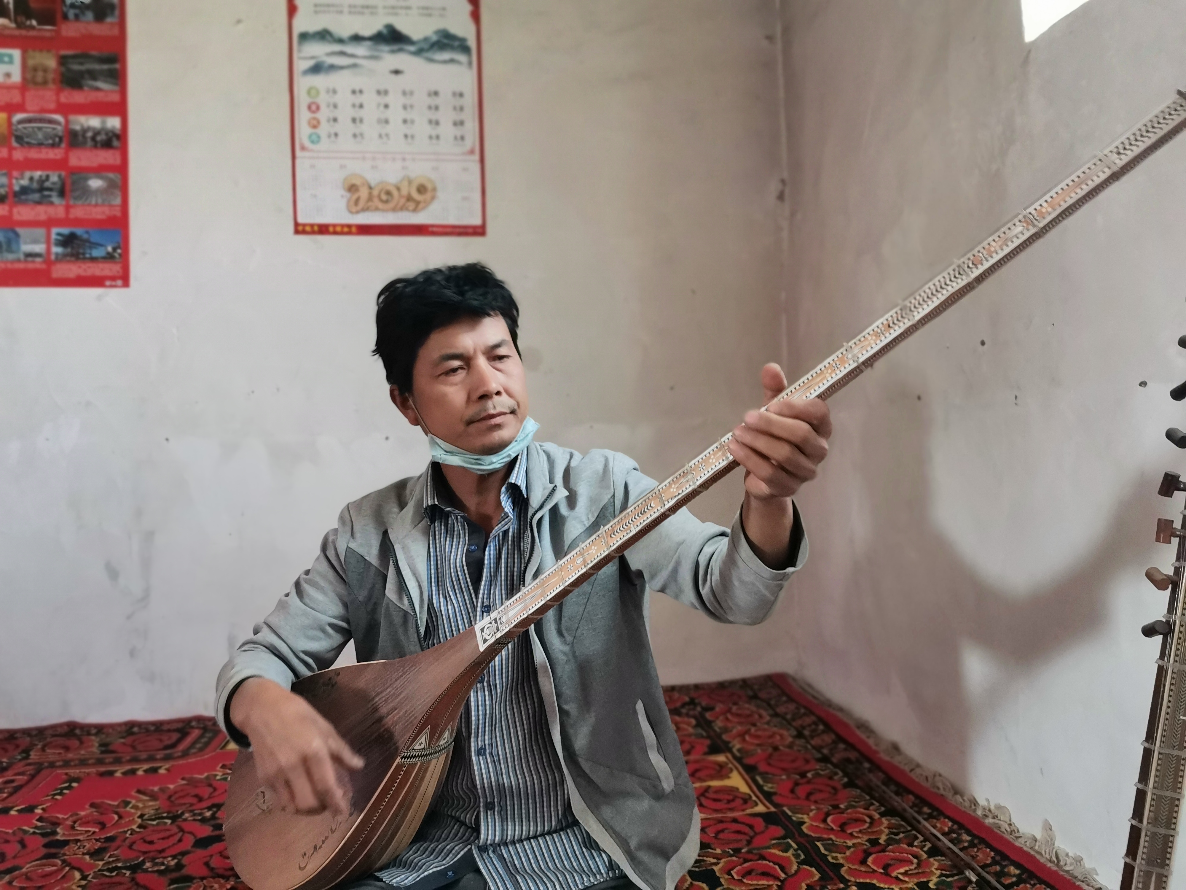 新疆选手塔依尔,塔伊尔民族乐器大全