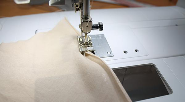 大弧形下摆卷边的技巧,下摆最快卷边手法视频