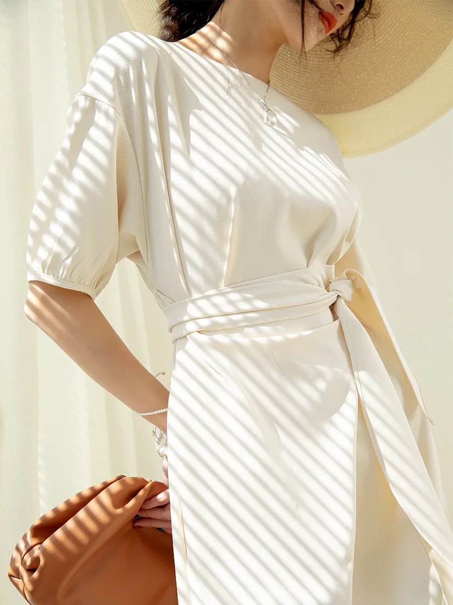 优雅连衣裙气质高级感小白裙,中长裙怎么穿才优雅时髦