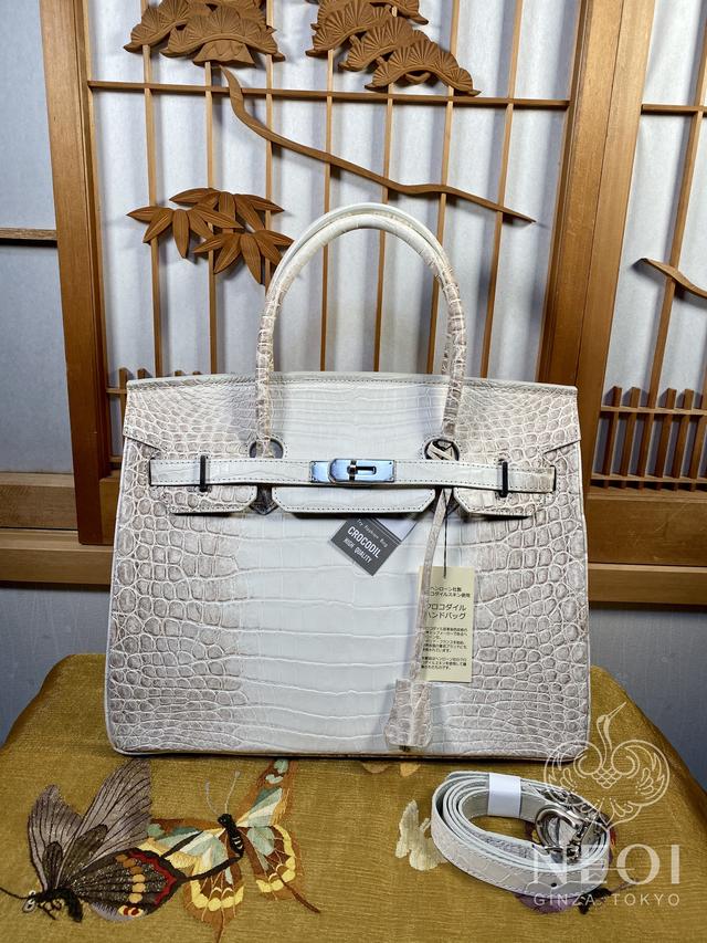 鳄鱼皮包和普通皮包区别,鳄鱼皮包选独皮还是骨皮