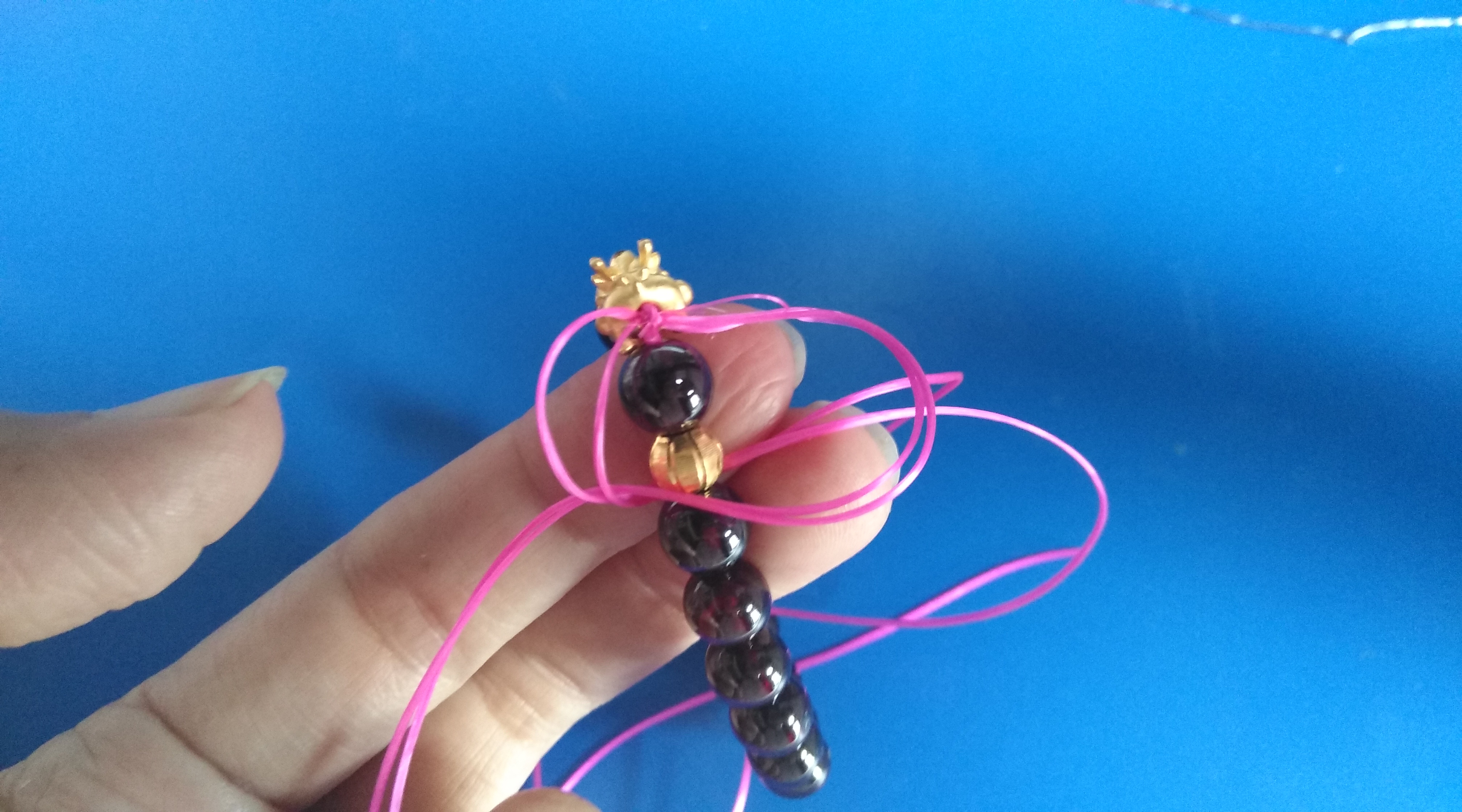 黄金貔貅转运珠手链编绳教程,貔貅黄金转运珠和朱砂怎么串