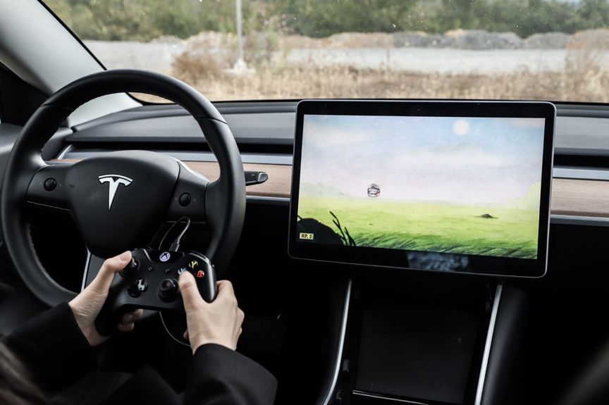 特斯拉秒变游戏厅,哪个软件可以下特斯拉游戏