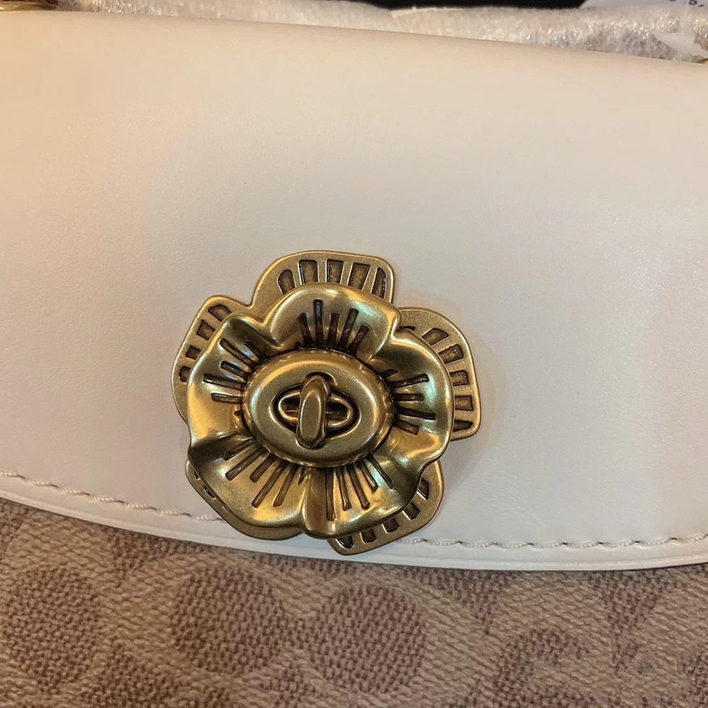 现在还有人买蔻驰吗,几百块钱能买到蔻驰真包吗