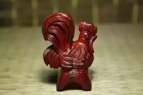 木雕兽头什么寓意,长颈鹿木雕婚礼摆件有什么寓意