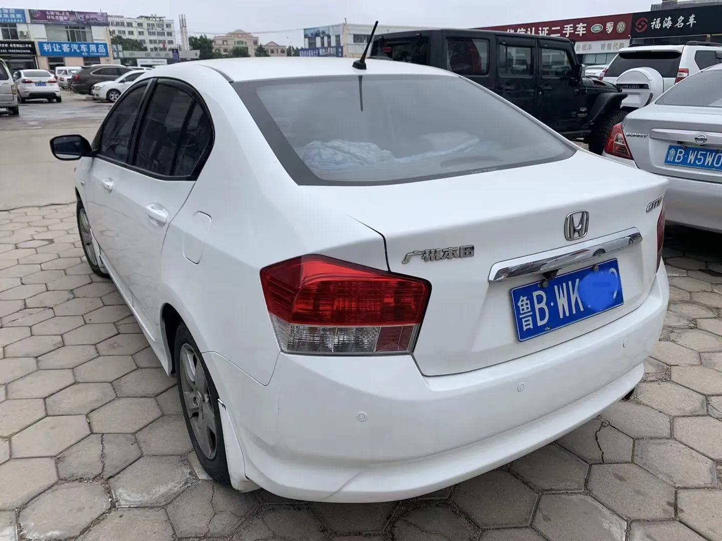 十年的二手车本田值多少钱,十年的本田锋范车卖多少钱