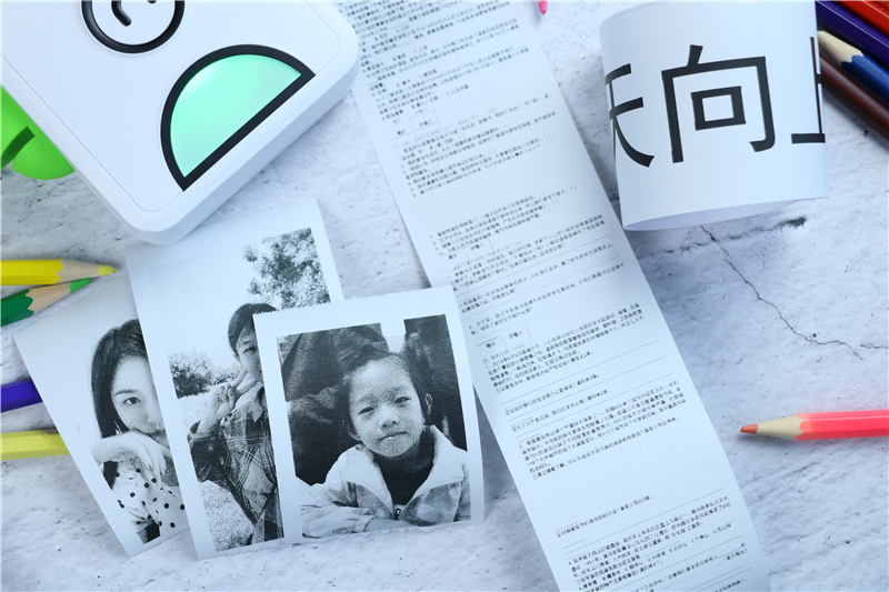 巴掌大小的打印照片的机器,手掌大小的微型口袋书打印