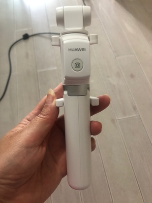 华为有线自拍杆的使用方法及操作,华为手机用自拍杆的使用方法图解