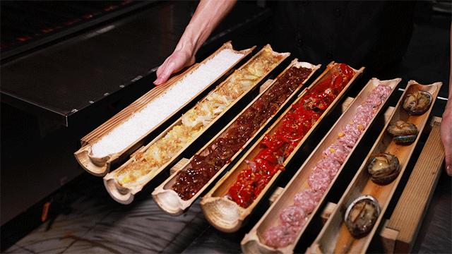 蒸鱼用竹筷子架上放盘子,用竹筒蒸的饭叫什么