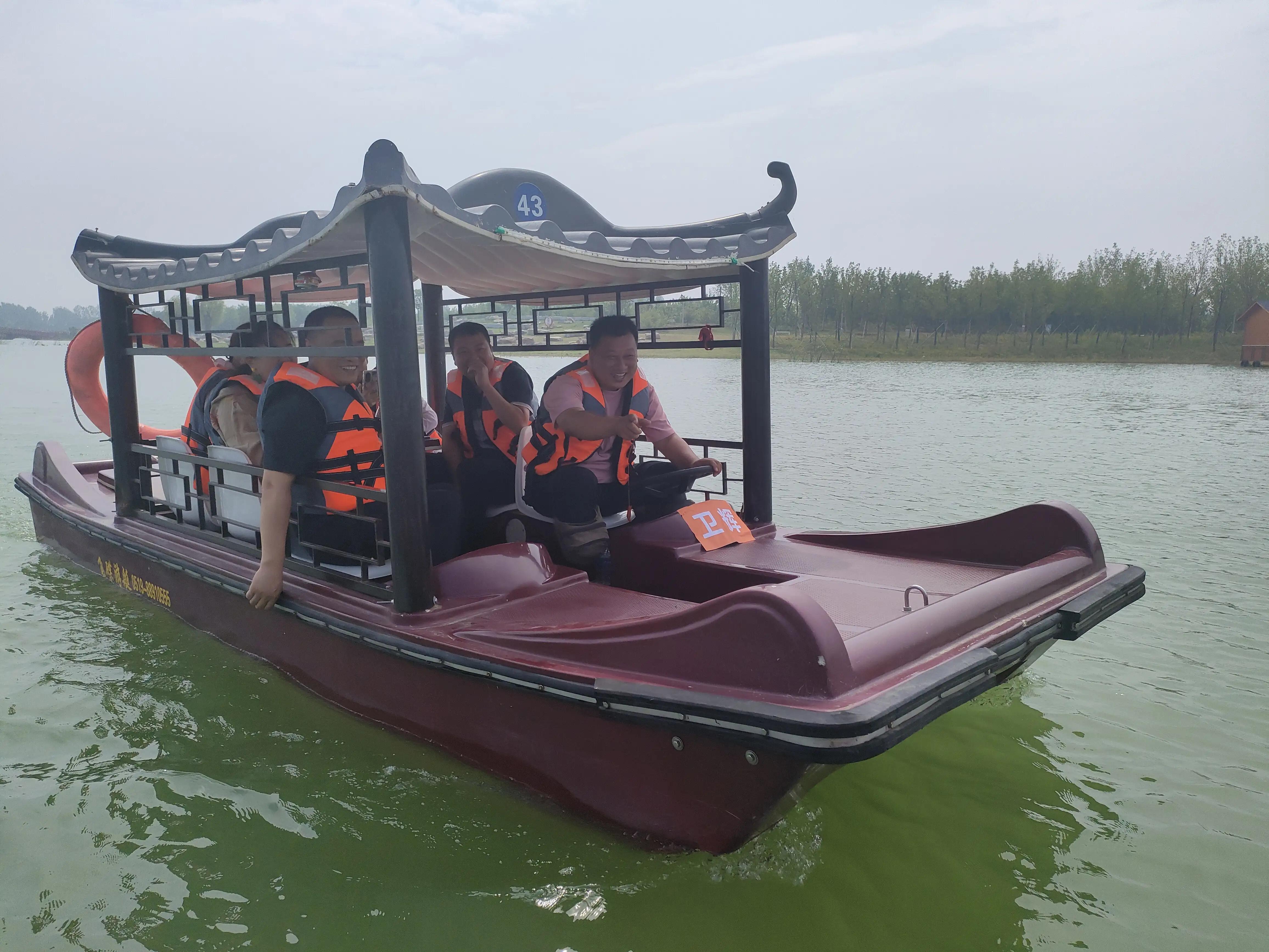 新乡移动长垣分会开展东片区“幸福1+1王家潭划船比赛”活动