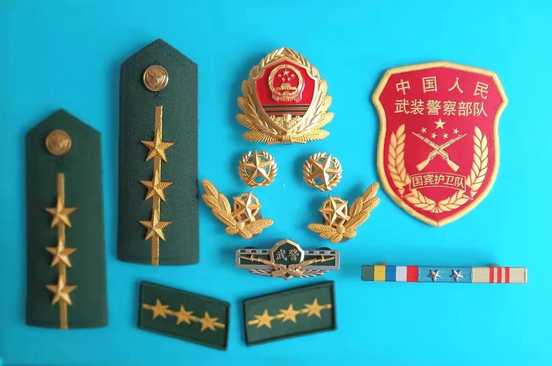 毛启国收藏帽徽图片,中国陆军狼牙特种部队肩章图片