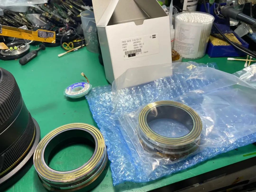 镜头买了2个月就坏,买的新镜头有坏点