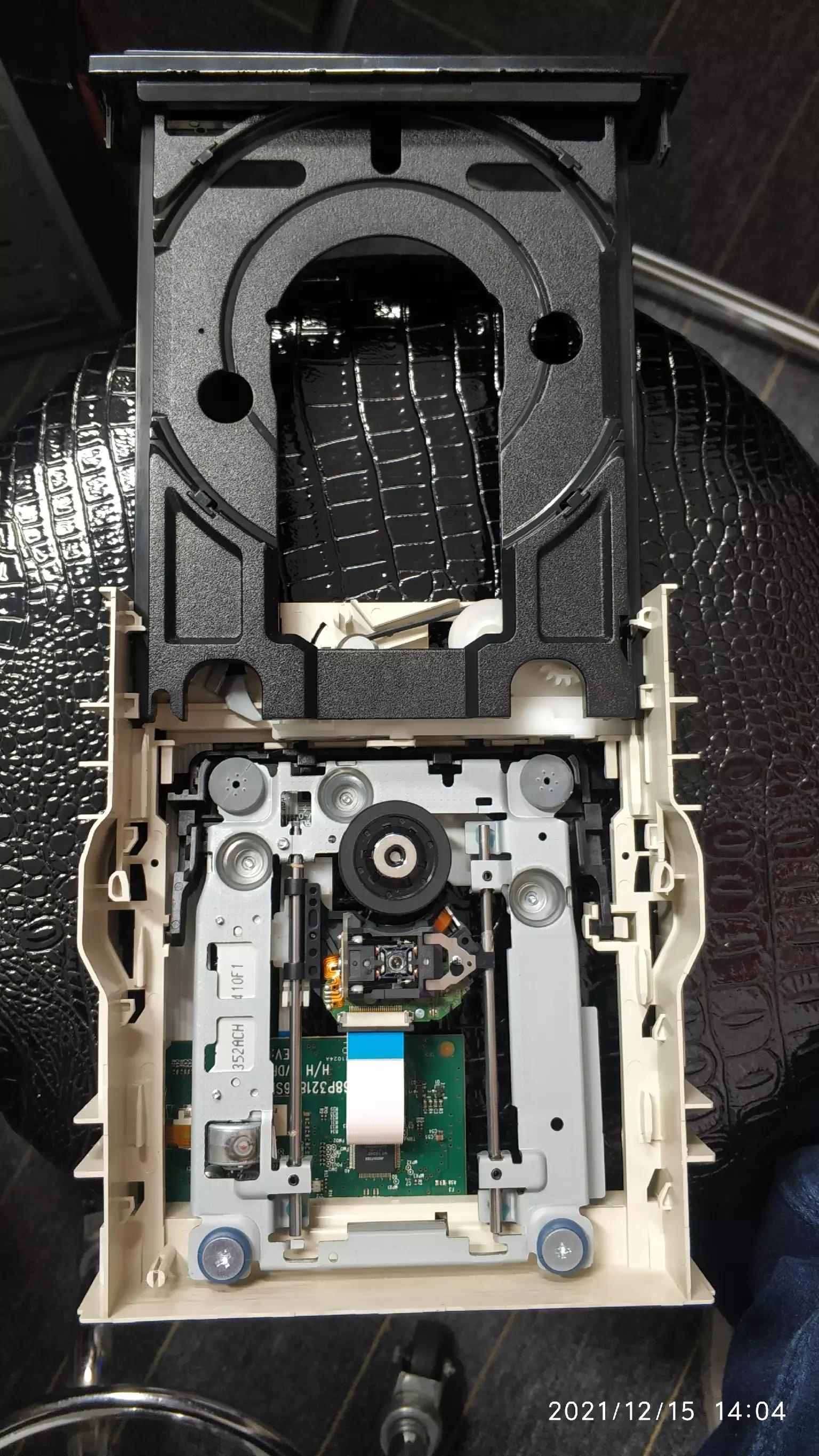 光驱弹出来如何装回去,光驱拆了怎么装