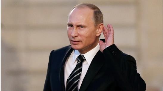 迷人小老头普京：当特工时接头都要迟到，曾牵着狗会见日本代表