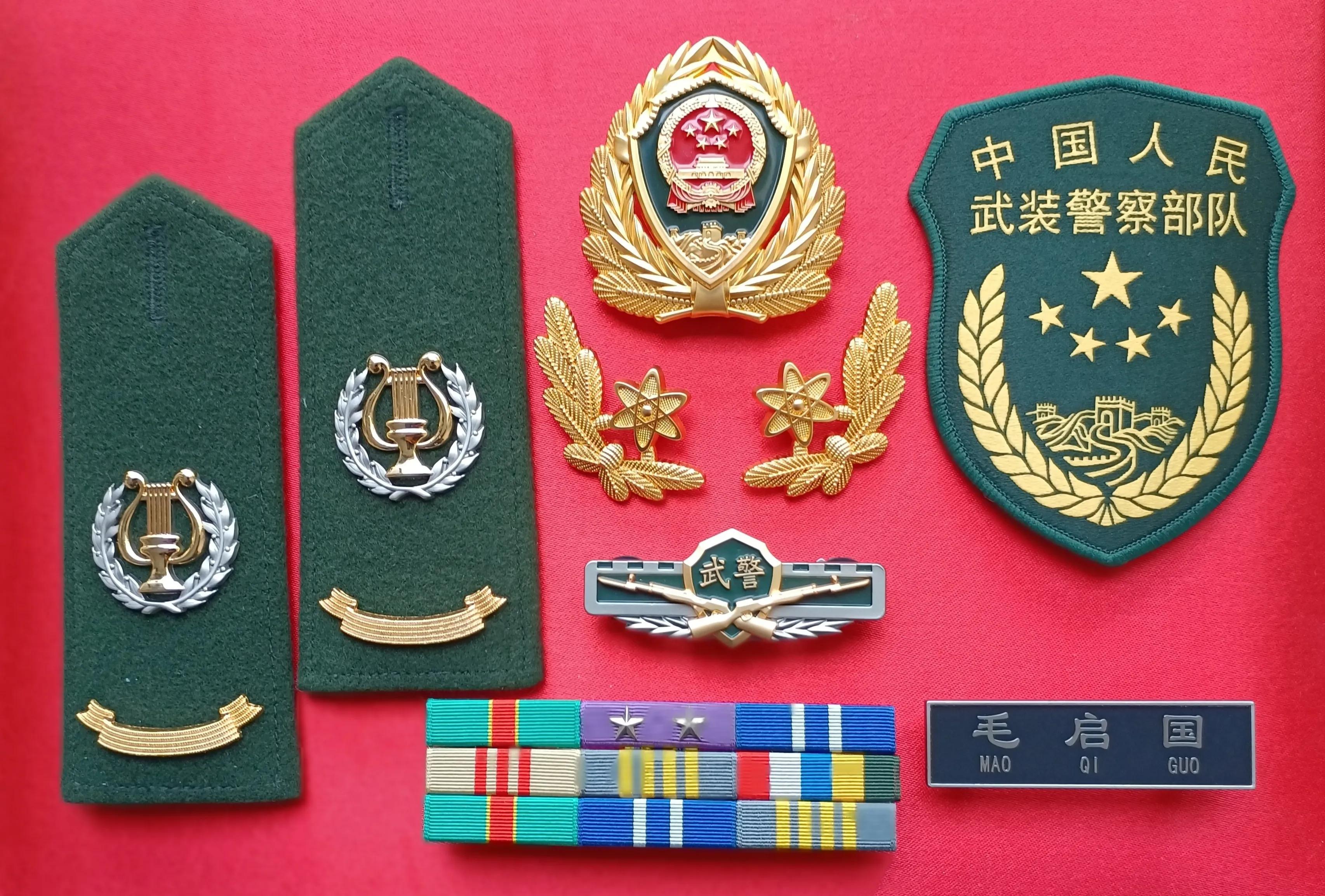 毛启国收藏帽徽图片,中国陆军狼牙特种部队肩章图片