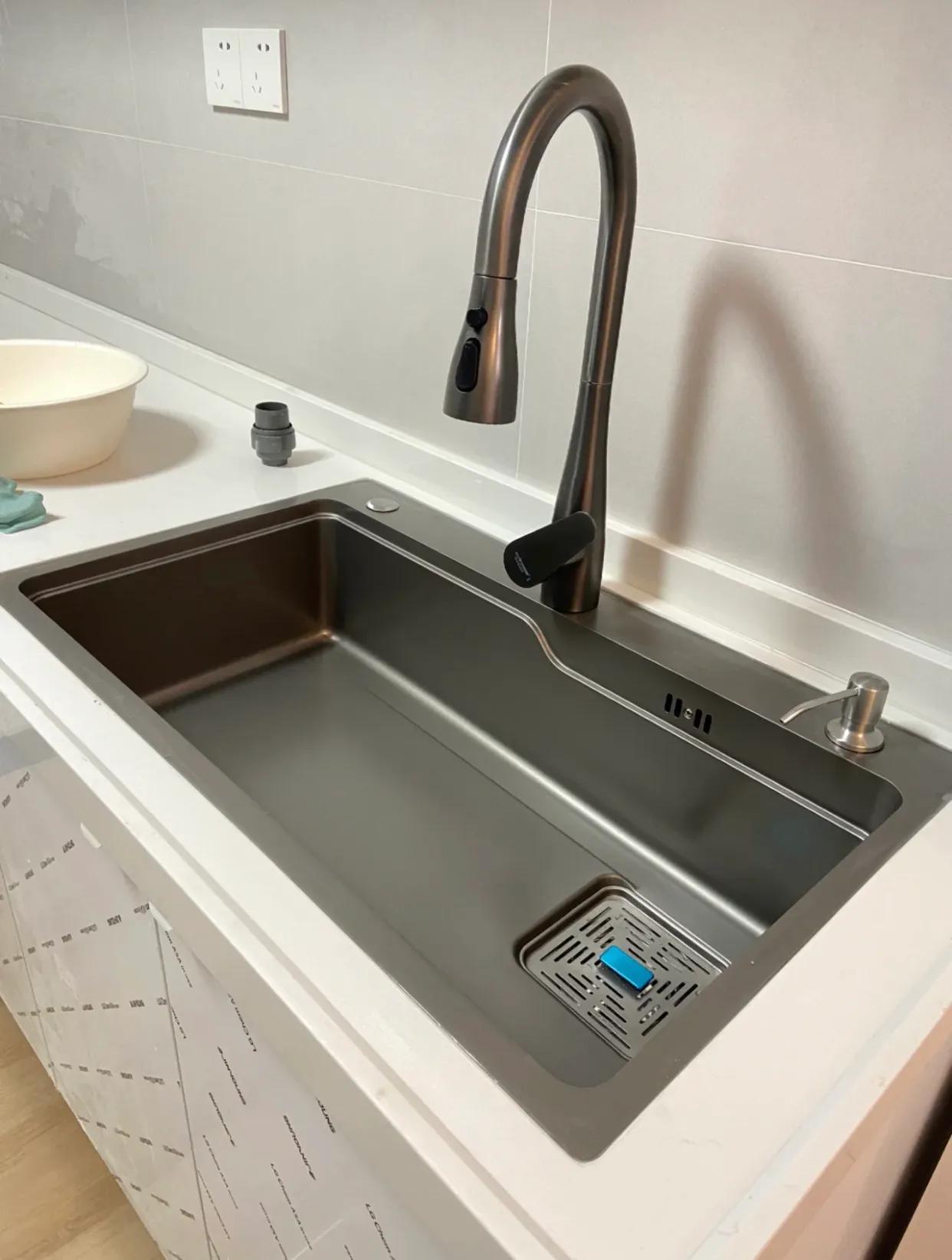 水槽怎么选好看又实用石英石水槽,石英石水槽和不锈钢水槽怎么选