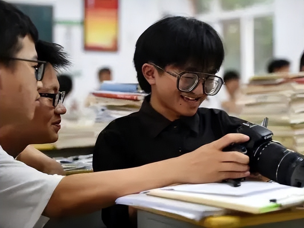 扭扭车男孩张亮哪里上大学,宿松县残疾人张亮