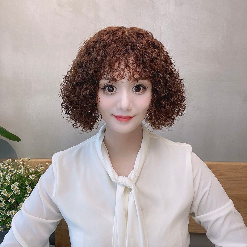 五十多岁的大妈留什么发型好看,50岁大妈头发细软塌适合什么发型