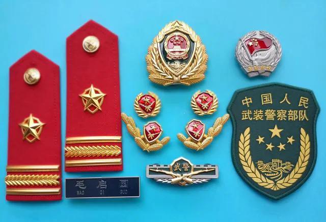 毛启国收藏帽徽图片,中国陆军狼牙特种部队肩章图片