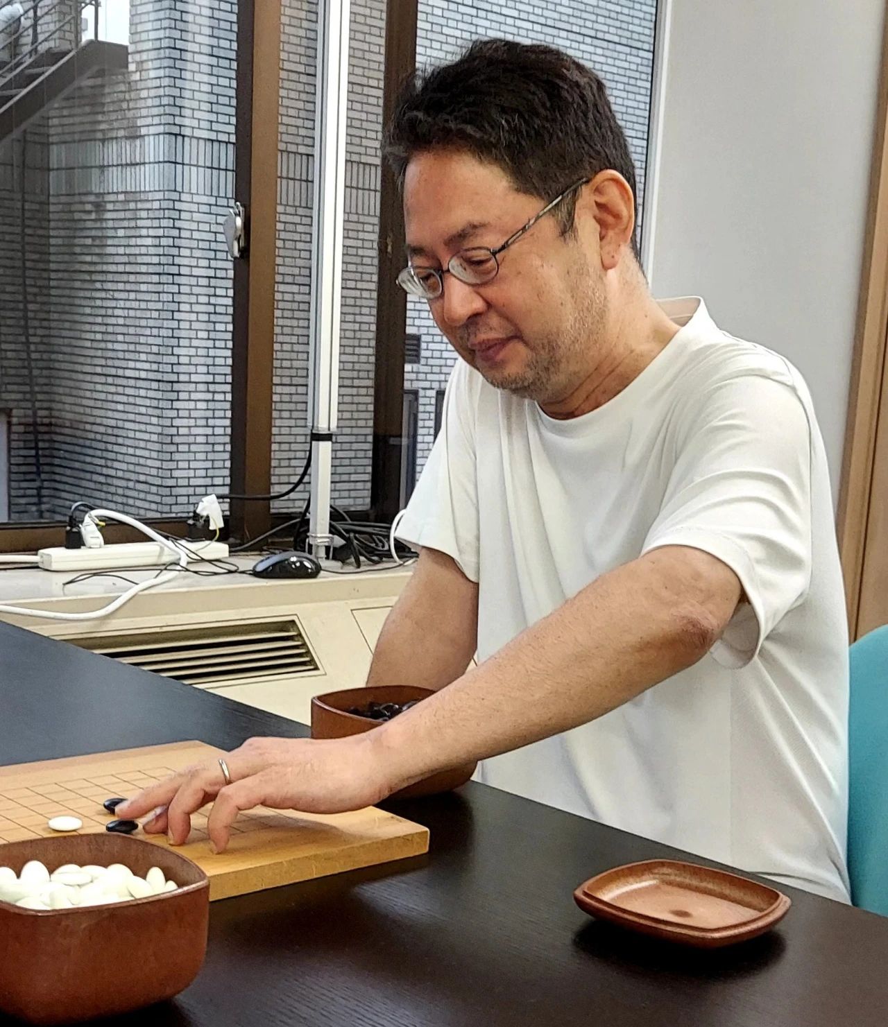 一个月2800盘，著名记者沉迷9路围棋写下感受