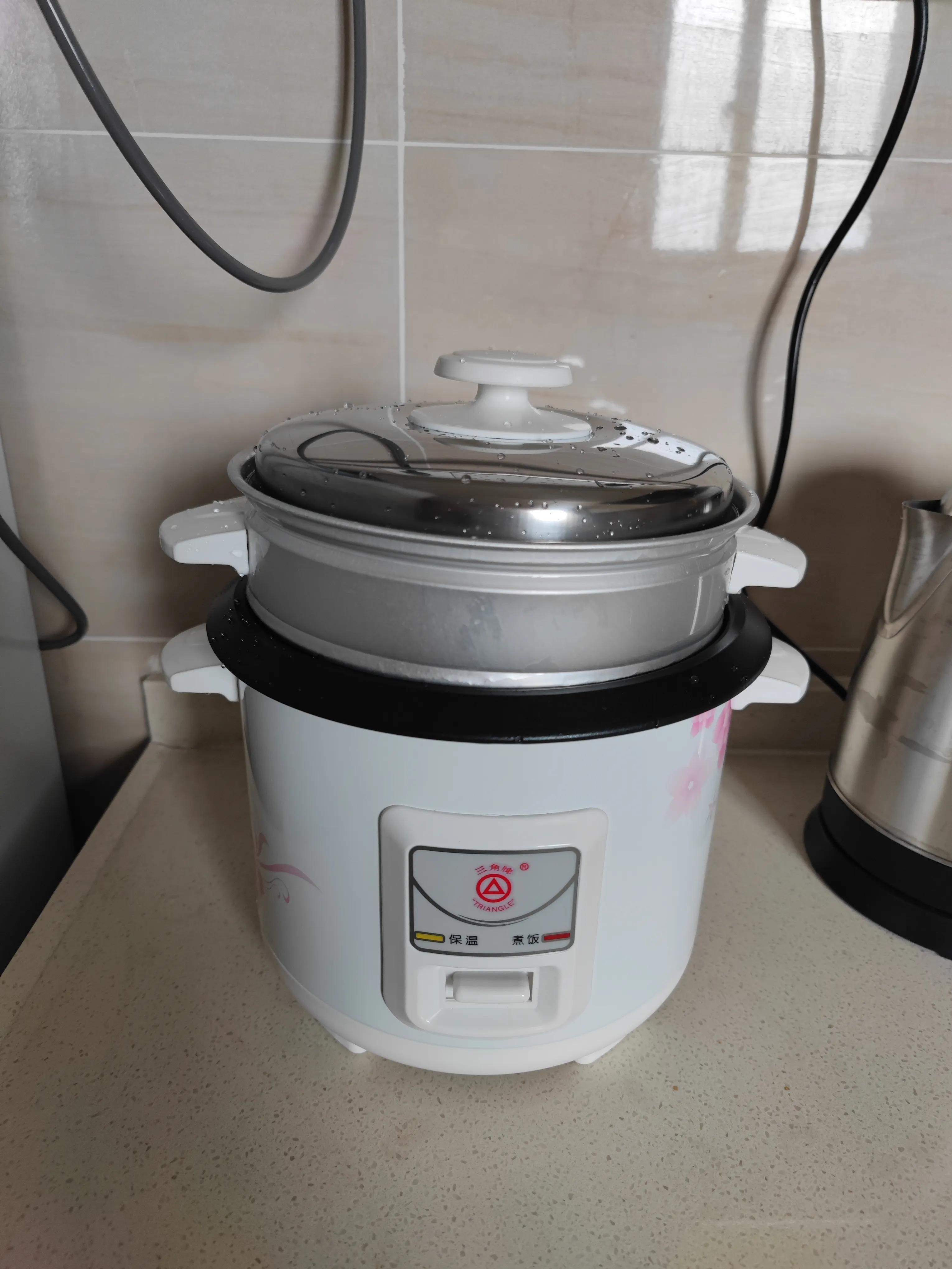 三角牌电饭煲怎么煮饭,正宗三角牌电饭煲标志
