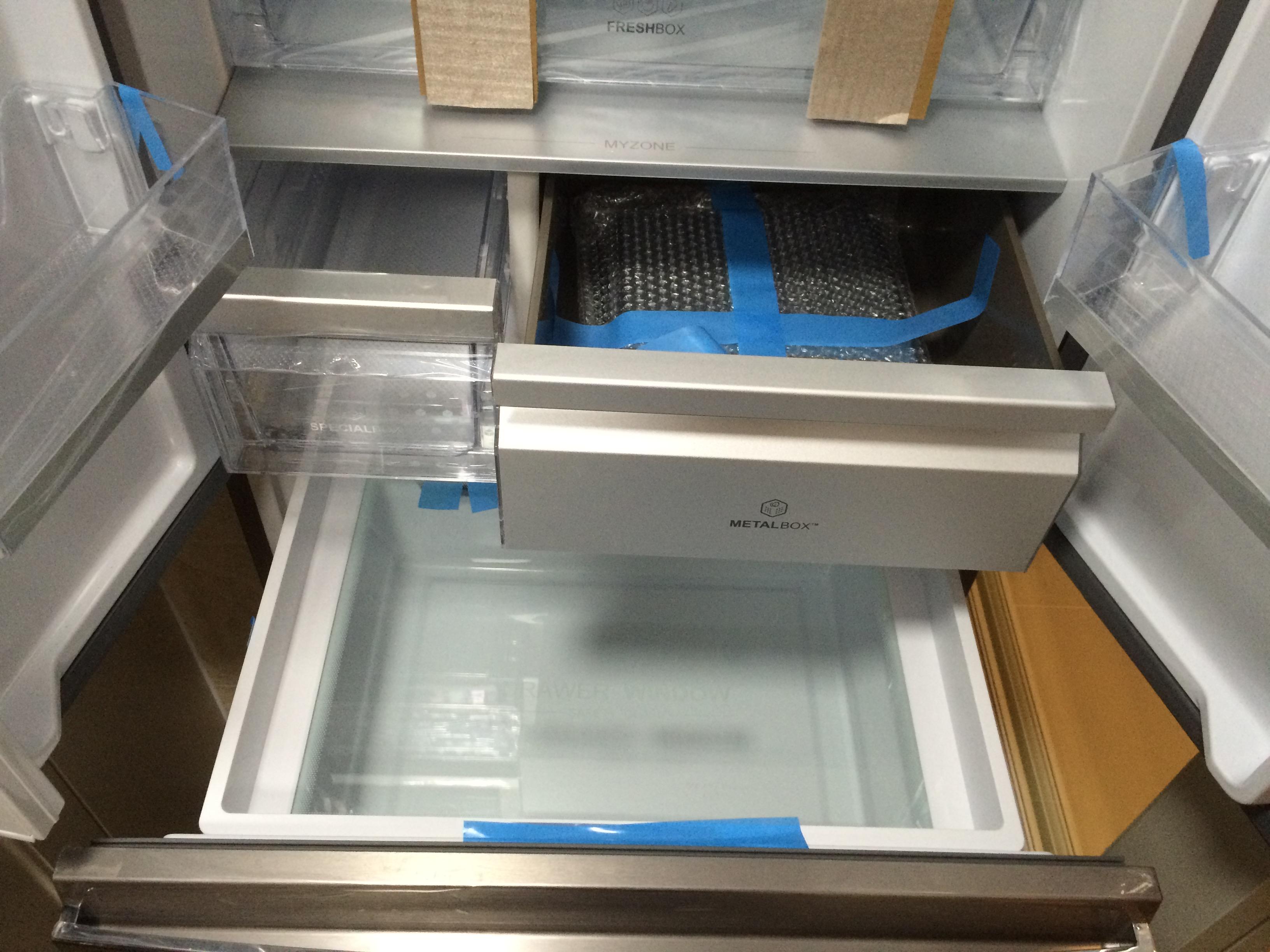 冰箱十字对开好还是双开门好,为什么冰箱双开门比十字开门便宜